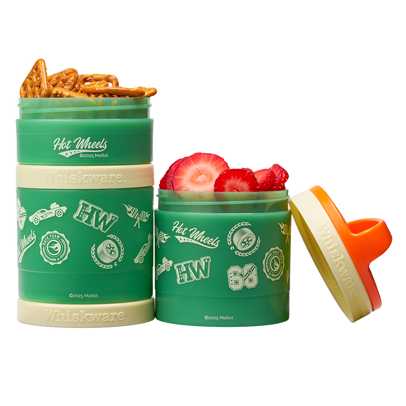 Green snack container with 'Hot Wheels' branding filled with snacks on a white background