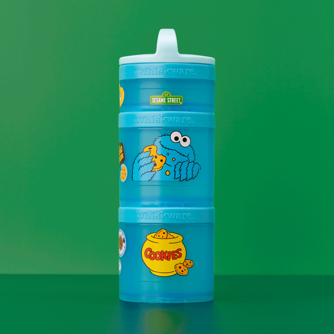 Rotating gif of Cookie Monster snack container in front of a green background.
