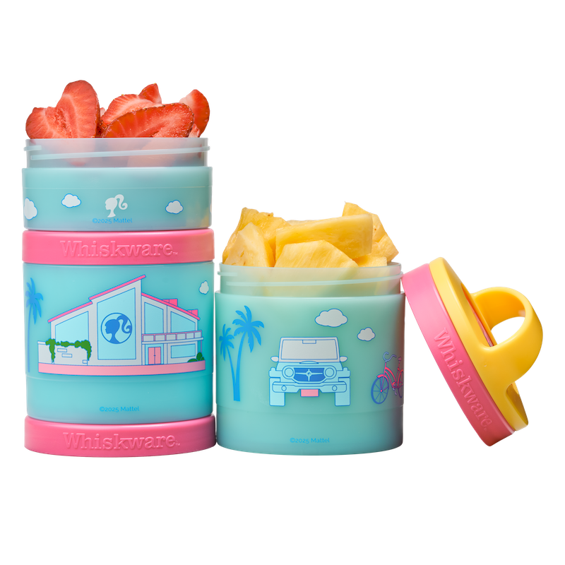 Two colorful Whiskware containers with Barbie dreamhouse and jeep designs filled with fruit.