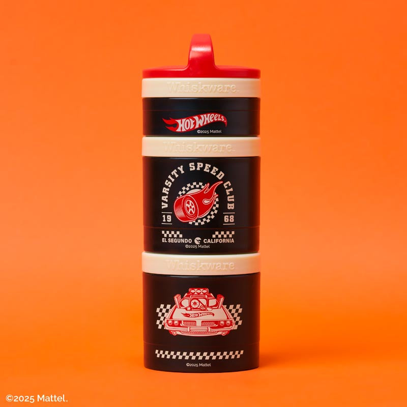 Hot Wheels snack container with red and black design on an orange background